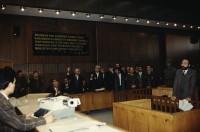 Image of sheet 19903006 photo 24: Prozess gegen drei kurdische Anwälte in Ankara, kurdische Türkei 1990.

 Im Staatsgericht Ankara. Der Prozess um den kurdischen Anwalt Vedat Aydin Nr. 5, der im Juli 91 von Todesschwadronen umgebracht wurde. Im Prozess wurden alle drei wegen Kurdisch sprechens verklagt, und später frei gesprochen. Mi: Ahmet Zeki Okçuoğlu, und re: Mustafa Oezer (HEP). In der Anklagebank. Umringt von türkischen Militärs. Die Verteidiger Innen, über 100, zogen sich unter Protest zurück und führten später ihre Plädoyer aus dem Zuschauerraum. Turkey Kurdish Kurds Die angeklagten kurdischen Anwälte v.l.n.r. Vedat Aydin, (Vedat Aydın, the Diyarbakır branch chairman of the now-defunct People’s Labor Party (HEP), was found dead on a road near Malatya on 7 July 1991, two days after armed men had taken him from his home in Diyarbakir.