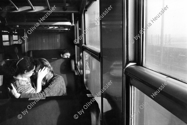 Image of sheet 19920080 photo 28: Young lovers on the train journey through the dead area of Czechia Chomutov Meanwhile the train runs slowly through the northern open cast mining region of brown coal, lovers dont care about the ecological desaster and catastrophe in the ambient.