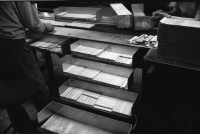 Image of sheet 19920100 photo 28: Im Dorf Dolmi Bojanovice.Eine alte Bäuerin. Der Weinbauer Franz Kubena. Im Weinkeller. In einer Parkettfabrik bei Hodonin. Frauen arbeiten am Fliessband. Abzeichnungen von Havel. Sprays gegen die Romas: 'Die Schwarzen ins Gas'. An einer Bushaltestellein Hodonin. Only for White. lautsprecher und Totenfahne. 1992 Tschechien