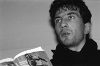 Image of sheet 19920150 photo 22: Lesung im Buchladen von Paranoia City. mit Raphael Zehnder alias Eva Maria Cuchulain, li. M. Spitteler, mi. und re. Constantin Seibt. To