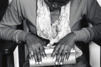 Image of sheet 19920170 photo 10: Das Schweizerische Zivilgesetzbuch in den Händen einer Afrikanischen Einwanderin. FIZ Zürich, 03.92 1992 √

A immigrant from Nigeria tries to understand the Swiss Civil-law.
Frauen Informations Zentrum FIZ center women woman Fachstelle Frauen Frauenhandel Frauenmigration √ women trafficking women's migration