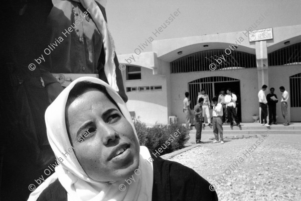 Image of sheet 19920300 photo 6: A young student of the School of Technology and Science in Khan Yunis. One of many here who is a member of the Hamas. 1992 Gaza Strip occupied territory √
Dr. Hayder Abd el Shafi Siedlung compound woman girl headscarf