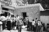 Image of sheet 19920310 photo 26: Jabalia-Camp wurde 1951 gebaut. 63000 Einwohner Innen. Al Akra Familie. Schneiderinnen. ab 17, Zahnärztin in Ein Duke Klinik bei Jericho. Westbank. El Ojer Klinik. Dr. Ousama Salah. Jiftlik, Gesundheitstag in Unrwa Schule. 1992 Palästina 04.92. Gazastreifen, Khan Younis Palästina 04.92 Gaza strip Palestine 1992 
Aus: Out of Jerusalem/ Jenseits von Jerusalem
Das Hilfswerk der Vereinten Nationen für Palästina-Flüchtlinge im Nahen Osten (engl.:United Nations Relief and Works Agency for Palestine Refugees in the Near East, kurz UNRWA) ist ein temporäres Hilfsprogramm der Vereinten Nationen (UN), das seit seiner Gründung 1949 regelmäßig um drei Jahre verlängert wurde (zuletzt bis zum 30. Juni 2008). Der Hauptsitz des Hilfswerkes war zunächst Beirut, wurde 1978 aufgrund der Unruhen im Libanon nach Wien und 1996 weiter nach Gaza verlegt.

al-Jiftlik (Arabic: الجفتلك‎) is a Palestinian town in the West Bank's Jordan Rift Valley several kilometers from the Jordanian border. According to the PCBS statistics for 2006, it was home to 4,401 and set on an area of 81,283 metric dunum.