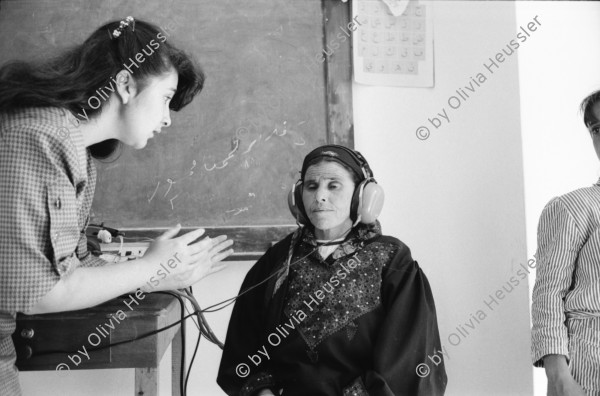 Image of sheet 19920320 photo 1: Gesundheitstag der Union of Palästinian Medical Relief Committees (UPMRC). in UNRWA Schule. Clinic. 24.5. Birzeit CFD und CSS Projekt für Kuhmilch. Sumaya Nazer und Jochi Weil. Munir Nazer. Alte Palästinenser/in. in Dura. Palestine 1992

al-Jiftlik (Arabic: الجفتلك‎) is a Palestinian town in the West Bank's Jordan Rift Valley several kilometers from the Jordanian border. According to the PCBS statistics for 2006, it was home to 4,401 and set on an area of 81,283 metric dunum.
United Nations Relief and Works Agency for Palestine Refugees in the Near East

Birzeit (Arabic: بيرزيت‎) (also written Bir Zeit) is a Palestinian town near Ramallah in the central West Bank. Its population in the 2007 census was 4529. Birzeit is a traditional Christian town. Its history dates back to the Byzantine era and earlier.