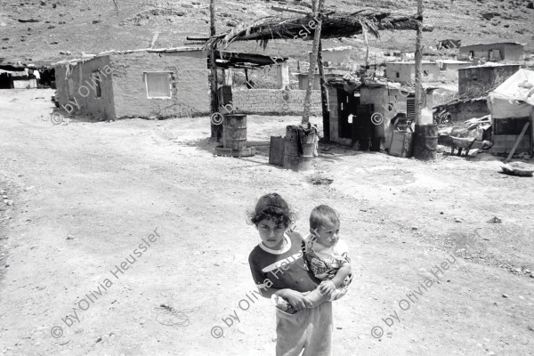 Image of sheet 19920320 photo 10: Aus: Jenseits von Jerusalem / Out of Jerusalem page 83
The village Jiftlik in the West bank where the Palestinian farmers live in wintertime has been destroyed several times by the Israeli military. April √
al-Jiftlik (Arabic: الجفتلك‎) is a Palestinian town in the West Bank's Jordan Rift Valley several kilometers from the Jordanian border. According to the PCBS statistics for 2006, it was home to 4,401 and set on an area of 81,283 metric dunum.
back by Libération, Paris 2015