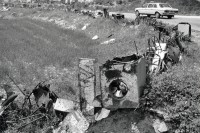 Image of sheet 19920330 photo 10: © 1992, Olivia Heussler / www.clic.li
Eine ausgediente Waschmaschine wird u.a. als Grenzmarkierung auf dem Feld eingesetzt. Bir Zeit , Westbank, Palästina. 04.92
Out of: Out of Jerusalem jenseits von Jerusalem page: 77 
Mercedes benz car washing machine
Used materials are marking the view. Palestine occupied territories 1992 √
Birzeit (Arabic: بيرزيت‎) (also written Bir Zeit) is a Palestinian town near Ramallah in the central West Bank. Its population in the 2007 census was 4529. Birzeit is a traditional Christian town. Its history dates back to the Byzantine era and earlier