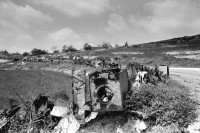 Image of sheet 19920330 photo 9: Eine ausgediente Waschmaschiene wird u.a. als Grenzmarkierung auf dem Feld eingesetzt. Bir Zeit, Westbank 04.92
Palestine Palästina occupied territory 1992 √

Old used materials are marking the view.
Birzeit (Arabic: بيرزيت‎) (also written Bir Zeit) is a Palestinian town near Ramallah in the central West Bank. Its population in the 2007 census was 4529. Birzeit is a traditional Christian town. Its history dates back to the Byzantine era and earlier