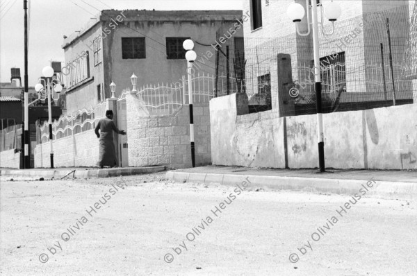 Image of sheet 19920340 photo 12: Siedlungen bei Nablus. Gerizim, Samariterkinder, Al Cazer, Wachturm aus osamnischer Zeit. Portrait Tochter Nazer. Munir und Omar Paschsa. Nablus. Jerusalem. Armenische Oster Prozession. Altstadt. Jerusalem Palästina Palestine
Occupied territory Palestine Palästina 1992 
Mount Gerizim (play /ˈɡɛrɨˌzɪm/; Samaritan Hebrew Ar-garízim, Arabic جبل جرزيم Jabal Jarizīm, Tiberian Hebrew הַר גְּרִזִּים Har Gərizzîm, Standard Hebrew הַר גְּרִיזִּים Har Gərizzim) is one of the two mountains in the immediate vicinity of the West Bank city of Nablus (biblical Shechem), and forms the southern side of the valley in which Nablus is situated, the northern side being formed by Mount Ebal. The mountain is one of the highest peaks in the West Bank and rises to 2849 feet (881 m) above sea level, 228 feet (69.5 m) shorter than Mount Ebal. The mountain is particularly steep on the northern side, is sparsely covered at the top with shrubbery, and lower down there is a spring with a high yield of fresh water.

The Samaritans (Hebrew: שומרונים‎ Shomronim, Arabic: السامريون‎ as-Sāmariyyūn) are an ethnoreligious group of the Levant, descended from ancient Semitic inhabitants of the region. Religiously the Samaritans are adherents of Samaritanism, an Abrahamic religion closely related to Judaism. Based on the Samaritan Torah, Samaritans claim their worship is the true religion of the ancient Israelites prior to the Babylonian Exile, preserved by those who remained in the Land of Israel, as opposed to Judaism, which they assert is a related but altered and amended religion, brought back by those returning from exile