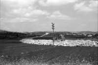 Image of sheet 19920340 photo 2: Siedlungen bei Nablus. Gerizim, Samariterkinder, Al Cazer, Wachturm aus osamnischer Zeit. Portrait Tochter Nazer. Munir und Omar Paschsa. Nablus. Jerusalem. Armenische Oster Prozession. Altstadt. Jerusalem Palästina Palestine
Occupied territory Palestine Palästina 1992 
Mount Gerizim (play /ˈɡɛrɨˌzɪm/; Samaritan Hebrew Ar-garízim, Arabic جبل جرزيم Jabal Jarizīm, Tiberian Hebrew הַר גְּרִזִּים Har Gərizzîm, Standard Hebrew הַר גְּרִיזִּים Har Gərizzim) is one of the two mountains in the immediate vicinity of the West Bank city of Nablus (biblical Shechem), and forms the southern side of the valley in which Nablus is situated, the northern side being formed by Mount Ebal. The mountain is one of the highest peaks in the West Bank and rises to 2849 feet (881 m) above sea level, 228 feet (69.5 m) shorter than Mount Ebal. The mountain is particularly steep on the northern side, is sparsely covered at the top with shrubbery, and lower down there is a spring with a high yield of fresh water.

The Samaritans (Hebrew: שומרונים‎ Shomronim, Arabic: السامريون‎ as-Sāmariyyūn) are an ethnoreligious group of the Levant, descended from ancient Semitic inhabitants of the region. Religiously the Samaritans are adherents of Samaritanism, an Abrahamic religion closely related to Judaism. Based on the Samaritan Torah, Samaritans claim their worship is the true religion of the ancient Israelites prior to the Babylonian Exile, preserved by those who remained in the Land of Israel, as opposed to Judaism, which they assert is a related but altered and amended religion, brought back by those returning from exile