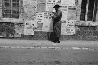 Image of sheet 19920350 photo 21: An Orthodox Jew standing in front of a poster wall in Mea Shearim.

From:  Out of Jerusalem / Jenseits von Jerusalem page Nr. : 27
back by Libération, Paris 2015