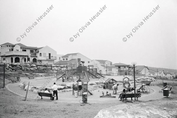 Image of sheet 19920430 photo 37: Spielplatz in der israelischen Siedlung Share Tikva. Israel
playground in the Israeli jewish settlement of Share Tikva is one of the oldest settlements in Israel. Occupied territory  children Palestine 1992 √ 
Aus: Out of Jerusalem / Jenseits von Jerusalem page 90 , 91