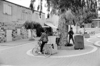 Image of sheet 19920440 photo 12: In Kafr Kassem leben vorallem fundamentalistische Palästinenser und Palästinenserinnen unter Sheik Daoish, in Israel. 05 1992 √

The Kafr Qasim massacre took place in the Israeli Arab village of Kafr Qasim situated on the Green Line, at that time, the de facto border between Israel and the West Bank on October 29, 1956. It was carried out by the Israel Border Police (Magav) and resulted in 48 Arab civilians dead, including 6 women and 23 children aged 8–17. Arab sources usually give the death toll as 49, as they include the unborn child of one of the women.