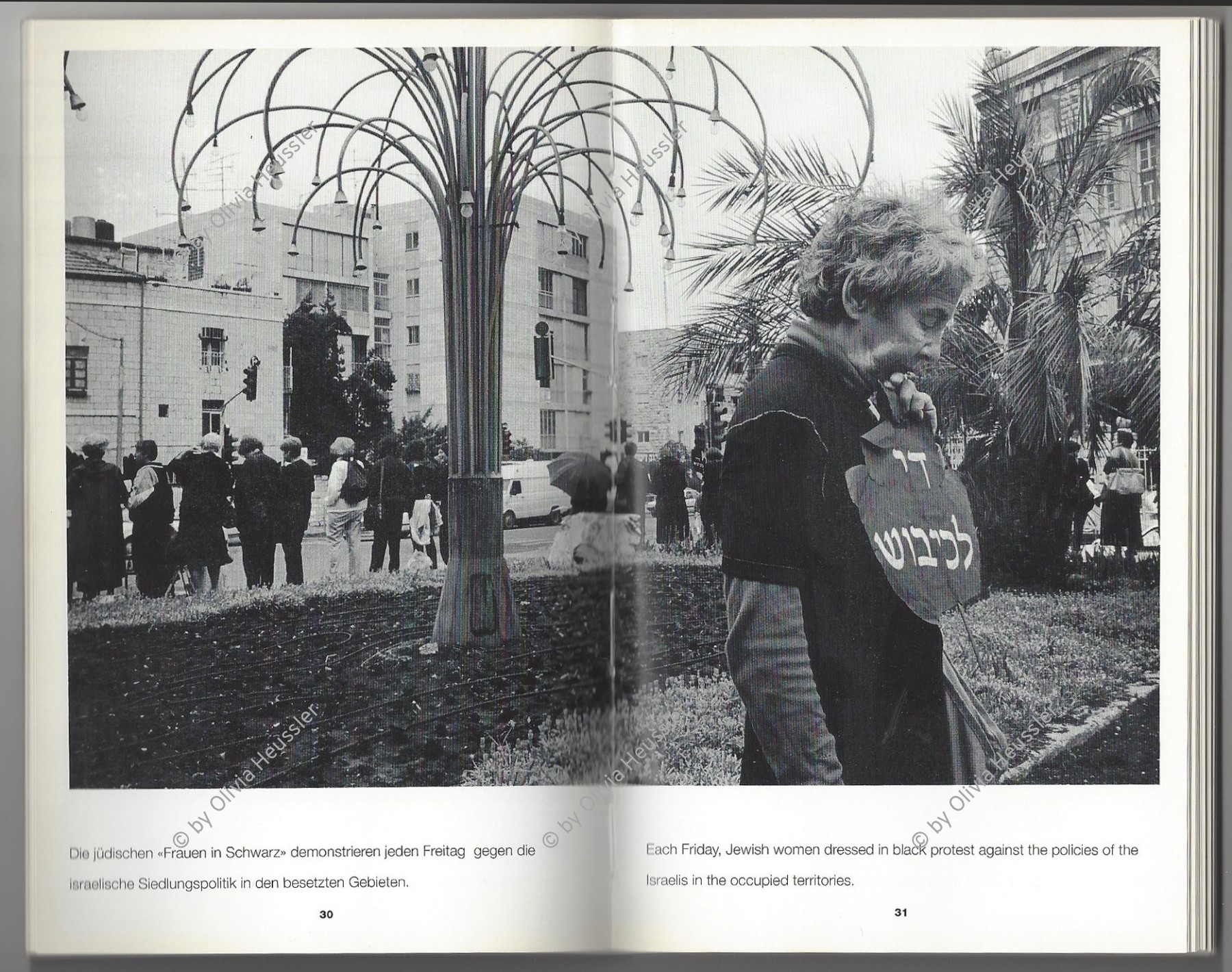 Image of sheet 19920440 photo 18: Protest Frauen in Schwarz

copyright by Olivia Heussler

Die Women in Black treffen sich seit Jahren im Zentrum West-Jerusalem, um gegen die israelische Siedlungspolitik in den besetzten Gebieten zu demonstrieren. 05.92 Jerusalem Israel. 1992 √
The Women in Black have been meeting for years in the center of West Jerusalem to demonstrate against the Israeli settlement policy of the Occupied Territories.
Aus: Jenseits von Jerusalem Out of Jerusalem page Nr. 31

Each friday, Jewish women dressed in black protest against the policies of the Israeli in the occupied territories.

Women in Black (Hebrew: נשים בשחור‎, Nashim BeShahor) is a women's anti-war movement with an estimated 10,000 activists around the world. The first group was formed by Israeli women in Jerusalem in 1988, following the outbreak of the First intifada.
Press archive printed media published with the use of a photography by Olivia Heussler: book.