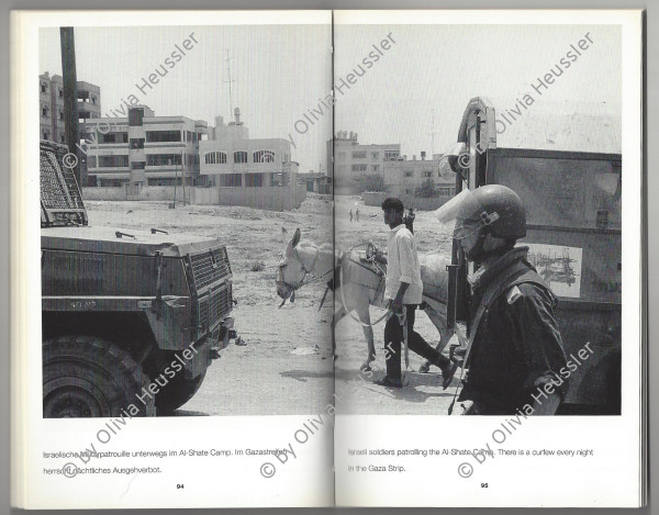 Image of sheet 19920450 photo 15: Les soldats israéliens d'un bataillon d'artillerie en patrouille par le camp d'Al Shate. Gaza. Palestine. 05.92

Un soldat israéliens d'un bataillon d'artillerie en patrouille par le camp d'Al Shate cherche des jeunes Palestiniens. Il y a encore la nuit Couvre-feu. Bande de gaza. Palestine 1992

Die israelischen Soldaten eines Artillerie-Bataillons. der Soldat suvht die Gegend nach jungen PalästinenserInnen ab. Noch immer herrscht nächtl. Ausgehverbot.

Military Patrol Israeli occupied territory Gaza Strip Palestine Al Shate Refugeecamp Refugees 1992 √ army civilian refugee and animal soldier human rights
Aus: Out of Jerusalem / Jenseits von Jerusalem page: 95
Israeli soldiers patrolling the Al shate camp. There is a curfew every night.

Israeli patrol in occupied territories in Gaza.
zurück von Libération, Paris 2015
«Counter-power» Altkirch 2017