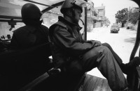 Image of sheet 19920450 photo 6: Soldaten sprechen mit Palästinensischen Frauen. Auf Rundfahrt durchs Flüchtlingslager. El Shate. Graffiti an Plexiglaswand des Militär Jeeps. Totenkopf und Be Happy.
Military Patrol Israeli occupied territory Gaza Strip Palestine Al Shate Refugeecamp Refugees 1992 

Khan Yunis (Arabic: خان يونس‎, also spelled Khan Younis or Khan Yunus; translation: Caravanserai [of] Yunis) is a city in the southern Gaza Strip. According to the Palestinian Central Bureau of Statistics, Khan Yunis had a population of 142,637 in 2007. Although Khan Yunis lies only four kilometers east of the Mediterranean Sea, its climate is semi-arid with temperature of 30 degrees Celsius maximum in summer and 10 degrees Celsius maximum in winter, with an annual rainfall of approximately 260 mm.


Al-Shati camp (Arabic: مخيّم الشاطئ‎), also known as Beach camp, is a Palestinian refugee camp located in the northern Gaza Strip along the Mediterranean Sea coastline in the Gaza Governorate, and more specifically Gaza City. The camp's total land area consists of 727 dunums. According to the Palestinian Central Bureau of Statistics (PCBS), al-Shati had a population of 87,158 inhabitants in mid-year 2006, while the United Nations Relief and Works Agency (UNRWA) reports a population of 78,800 registered refugees. The camp is the third largest refugee camp in the Palestinian Territories