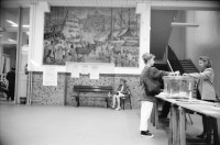 Image of sheet 19920600 photo 20: Mit Esther Woerdehoff und X in den Katakomben Place Denfert Rochereau Tor von alter Stadtmauer ehem. Zollhäuser Kalksteinlager ausgebeutet seit 1785 wurden die leeren Steinbrüche mit Millionen Knochen und Schädeln der zahlreichen Friedhöfe ausfefüllt. Nach Freidhöfen geordnet. Kreuz. In einer Schule wird über das Referendum (Maastrichter Verträge über Beitritt der Franzosen in die EG) abgestimmt. OUI und NON. Vorhang system. Mann mit Baguette unter dem Arm. Paris France frankreich 1992

The Catacombs of Paris or Catacombes de Paris are an underground ossuary in Paris, France. Located south of the former city gate (the "Barrière d'Enfer" at today's Place Denfert-Rochereau), the ossuary holds the remains of about six million people and fills a renovated section of caverns and tunnels that are the remains of Paris's stone mines. Opened in the late 18th century, the underground cemetery became a tourist attraction on a small scale from the early 19th century, and has been open to the public on a regular basis from 1874. Following an incident of vandalism, they were closed to the public in September 2009 and reopened 19 December of the same year