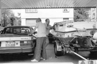 Image of sheet 19930340 photo 9: At the gasstation. To fill the tank of a boat and a car. motor gasoline