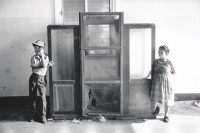 Image of sheet 19930500 photo 18: Mann Man and Woman Frau in der Kirche Santo Domingo steht ein Beichtstuhl. Managua Nicaragua 1993 √ 
confessional box both

während:

Fiesta patronal en honor a Santo Domingo de Guzmán, patrón de Managua. Santo Domingo, Dpto. de Managua, 1 de agosto de 1993
Patron Saint’s Day festivities for Santo Domingo de Guzmán, the patron saint of Managua. Santo Domingo, Dep. Managua, August 1, 1993
