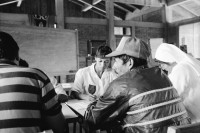Image of sheet 19930610 photo 35: In der Finca 'El Cortijo'werden Promotores ausgebildet. Pflanzen werden gepflückt, angeschrieben und zwischen Zeitungen gepresst. (Barricada). Portrait Pedro Linger.In der Barranca, einem Schulungszentrum in der Nähe von Esteli, ist der theoretische Kurs. Dort werden aber auch Seifen hergestellt. Einige katholische Nonnen sind dabei. Nicaragua 1993
