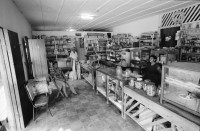 Image of sheet 19930630 photo 12: Vor der Apotheke Sta. Martha von Juan Ramon Zavala in Condega. Interieur. Er verkauft Organische und Chemische Heilmedizin.