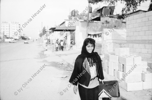 Image of sheet 19931230 photo 5: Kinder vor graffitti für den Frieden in Gaza City. Frauen und
 Mütter Protest vor CICR IKRK Sitz in Gaza, einer Palästinenserin.
 In jüdischer Siedlung Neve Deqalim Gush Katif. Karte
 Gazastreifen. Soldatinnen. Mädchen Schulklasse. 2 Junge jüdische
 Buben Einkaufszentrum Soldaten und Soldatinnen Knaben hinter
 Gitter. brennende Autoreifen in Khan Yunis aus Protest gegen
 Tötung von Fatah Hawks Achmed Abu Rish (25) durch Undercover
 Israeli Soldaten nachdem er sich ergeben hat am 28.11 Vortag. Totenfeier. Mann auf Pferdewagen.
Hindah El Amudi (Omsalin) protest's since years every friday for the liberation of her 4 sons in prison. ICRC Headquater of Gaza 28.11.1993

Gush Katif (Hebrew: גוש קטיף, lit. Harvest Bloc) was a bloc of 17 Israeli settlements in the southern Gaza strip. Gush Katif was specifically mentioned by Yitzhak Rabin, the Israeli prime minister who fell victim to an assassin in 1995, as essential to Israel's security border.[1] In August 2005, the Israeli army moved the 8,600 residents of Gush Katif to Israel. They were evicted from the area and their homes demolished as part of Israel's unilateral disengagement plan from the Gaza Strip portion of the Palestinian Territories.