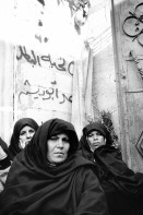 Image of sheet 19931240 photo 8: Frauen trauern um den Tod des Al Fatah Kaempfers, der nachdem er sich beim israelischen Militaer ergeben hatte, von diesem erschossen wurde, Khan Yunis, Gaza 1993. 

 death women palestinian strip military in sorrow in bourka 1993 √

These women are mourning for the young Fatah fighter Abu Rish, who after give up to the Israeli military, was killed by them. Palestine Gaza Strip 
Khan Yunis Camp (Arabic: مخيم خان يونس‎, also spelled Khan Younis Camp) is a Palestinian refugee camp in the Khan Yunis Governorate just west of the city of Khan Yunis and two kilometers east of the Mediterranean coast in the southern Gaza Strip. While UNRWA states that there were approximately 72,000 Palestinian refugees living in the camp in 2010, the Palestinian Central Bureau of Statistics recorded a population of 37,705 in the 2007 census.

© 1993, Olivia Heussler