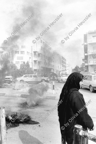 Image of sheet 19931250 photo 18: Strassensperren während der Geburtstags Demo für Georges Habash's PLFP. Ramallah, Westbank 12.93 √ 1993 Protest against Israeli occupied territory Palestine Women Mother Woman arab muslim Palestinian
protest tear gaz