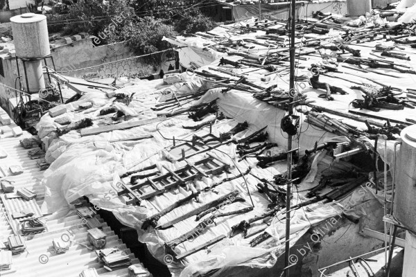 Image of sheet 19931310 photo 6: View over the roofs of the huts in Jabalia
copyright by Olivia Heussler
Gazastreifen 12. 1993 √ 
Jabalia Camp (Arabic: مخيّم جباليا‎) is a Palestinian refugee camp located 3 kilometers (1.9 mi) north of Jabalia. The refugee camp is in the North Gaza Governorate, Gaza Strip. According to the Palestinian Central Bureau of Statistics, the camp had a population of 93,455 in mid-year 2006
Shadows and other Natures