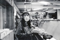 Image of sheet 19931320 photo 6: Carol, 19, verdient in der Angel's bakery 7 NIS in der Stunde. (Schwarzmarktwechsel 1US$ = 3NIS) West Jerusalem 12. 1993 √ Israel Palestine 
mmi chewing gum work Women young worker woman work angels bakery shop Israeli Israel Palestine bread
Carol, 19, former Military soldier in the Israeli army works after the military service, in a bakery and earns NIS 7 per hour
