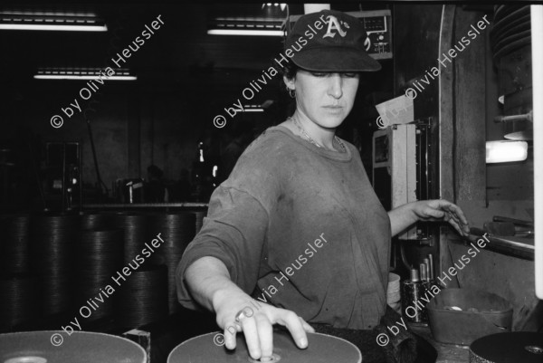 Image of sheet 19931400 photo 15: Fitnessclub. Frau. Altersheim. beim Billard spielen. Portrait Michal Amir, 23 ig. Kibbutz Sarid, 30099 06 548120 Israel arbeitet in Fabrik Flex. Portrait mit Fahrrad Velo und während ihrer Arbeit an einer Presse  Michal raucht 1993 Israel Palestine Frau Women work industry bicycle worker work Arbeit young 

A kibbutz (Hebrew: קִבּוּץ / קיבוץ, lit. "gathering, clustering"; plural kibbutzim) is a collective community in Israel that was traditionally based on agriculture. Today, farming has been partly supplanted by other economic branches, including industrial plants and high-tech enterprises.[1] Kibbutzim began as utopian communities, a combination of socialism and Zionism. In recent decades, some kibbutzim have been privatized and changes have been made in the communal lifestyle. A member of a kibbutz is called a kibbutznik (Hebrew: קִבּוּצְנִיק).

Kibbutz Sarid (Hebrew: שָׂרִיד) (lit. "Remnant") is a kibbutz in northern Israel. Located near Migdal HaEmek, it falls under the jurisdiction of Jezreel Valley Regional Council. In 2006 it had a population of 590