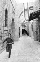 Image of sheet 19931430 photo 17: Jerusalem Israel 1993

Während des Gebets an der Klagemauer. Jerusalem 24.12. 1993 √
Altstadt Old town

The Western Wall, Wailing Wall or Kotel (Hebrew: About this sound הַכֹּתֶל הַמַּעֲרָבִי (help·info), translit.: HaKotel HaMa'aravi; Ashkenazic pronunciation: Kosel; Arabic: حائط البراق‎, translit.: Ḥā'iṭ Al-Burāq, translat.: The Buraq Wall) is located in the Old City of Jerusalem at the foot of the western side of the Temple Moun