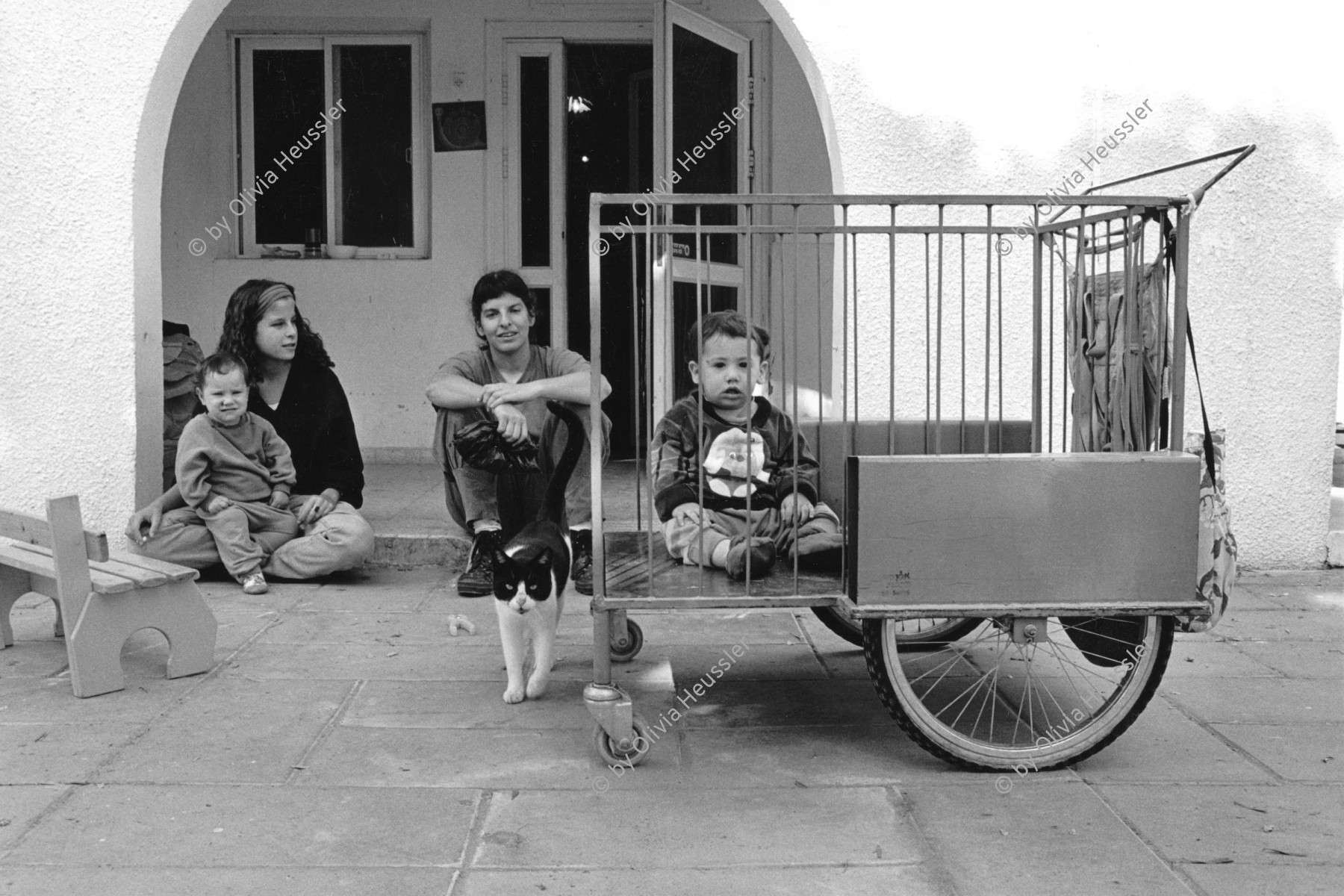 Image of sheet 19931470 photo 10: Diese zwei Frauen betreuen u.a. die Kleinkinder des Kibbutz. Kinderwagen 


Samar (Hebrew: סָמָר) is a kibbutz in the Arabah valley in the far south of Israel. Located near Eilat, it falls under the jurisdiction of Hevel Eilot Regional Council.

These two women serve in the club for infants of the Kibbutz Samar 1993
Palestine 
trolley baby 
© 1993, Olivia Heussler √