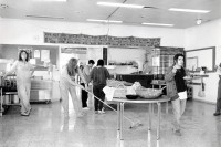 Image of sheet 19931470 photo 30: © 1993, Olivia Heussler / www.clic.li
Frauen in der Kantine. Kibbutz Samar, an der Grenze zu Jordanien, 1993 Israel 12.93 Kitchen food Women lunch eating dining room
√
Samar (Hebrew: סָמָר‎‎) is a kibbutz in the Arabah valley in the far south of Israel. Located near Eilat, it falls under the jurisdiction of Hevel Eilot Regional Council.

A kibbutz (Hebrew: קִבּוּץ / קיבוץ, lit. "gathering, clustering"; plural kibbutzim) is a collective community in Israel that was traditionally based on agriculture. Today, farming has been partly supplanted by other economic branches, including industrial plants and high-tech enterprises.[1] Kibbutzim began as utopian communities, a combination of socialism and Zionism. In recent decades, some kibbutzim have been privatized and changes have been made in the communal lifestyle. A member of a kibbutz is called a kibbutznik (Hebrew: קִבּוּצְנִיק).
