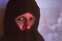 Image of sheet 19933005 photo 26: a Totenfeier bei Mutter von Abu Rish
Frauen sitzen um sie herum. 30.11.1993 
Women in sorrow with mother of killed Al Fatah fighter Abu Rish by Israeli army. Abu Rish was killed by a mistake after he desarmed. Gazastrip Palestine 
Mothers Gaza death women young mourns