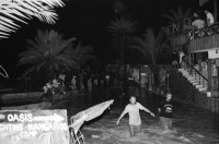 Image of sheet 19940010 photo 17: Englische touristen mit Beduinen. In Dahab gibt es nach starkem Regen
heftige überschwemmungen. Hochwasser. René Suter und Olivia Heussler mit Hotel angestellter im Hotelzimmer auf Bett, Matratze steht. Sinai ehemaliger Moshav Aegypten Egypt 1994 flood
Dahab (Egyptian Arabic: دهب or ذهب,IPA: [ˈdæhæb], gold) is a small town situated on the southeast coast of the Sinai Peninsula in Egypt. Formerly a Bedouin fishing village, located approximately 80 km (50 mi) northeast of Sharm el-Sheikh, Dahab is considered to be one of the Sinai's most treasured diving destinations. Following the Six Day War, the town was occupied by Israel and was known in Hebrew as Di-Zahav; named after a place mentioned in the Bible
