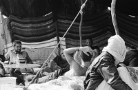 Image of sheet 19940010 photo 3: Englische touristen mit Beduinen. In Dahab gibt es nach starkem Regen
heftige überschwemmungen. Hochwasser. René Suter und Olivia Heussler mit Hotel angestellter im Hotelzimmer auf Bett, Matratze steht. Sinai ehemaliger Moshav Aegypten Egypt 1994 flood
Dahab (Egyptian Arabic: دهب or ذهب,IPA: [ˈdæhæb], gold) is a small town situated on the southeast coast of the Sinai Peninsula in Egypt. Formerly a Bedouin fishing village, located approximately 80 km (50 mi) northeast of Sharm el-Sheikh, Dahab is considered to be one of the Sinai's most treasured diving destinations. Following the Six Day War, the town was occupied by Israel and was known in Hebrew as Di-Zahav; named after a place mentioned in the Bible