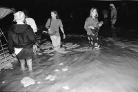 Image of sheet 19940010 photo 8: Englische touristen mit Beduinen. In Dahab gibt es nach starkem Regen
heftige überschwemmungen. Hochwasser. René Suter und Olivia Heussler mit Hotel angestellter im Hotelzimmer auf Bett, Matratze steht. Sinai ehemaliger Moshav Aegypten Egypt 1994 flood
Dahab (Egyptian Arabic: دهب or ذهب,IPA: [ˈdæhæb], gold) is a small town situated on the southeast coast of the Sinai Peninsula in Egypt. Formerly a Bedouin fishing village, located approximately 80 km (50 mi) northeast of Sharm el-Sheikh, Dahab is considered to be one of the Sinai's most treasured diving destinations. Following the Six Day War, the town was occupied by Israel and was known in Hebrew as Di-Zahav; named after a place mentioned in the Bible