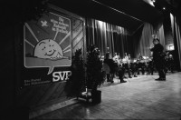 Image of sheet 19940080 photo 11: frtsg. Albisgüetli Tagung der SVP. in Zürich. Blasmusik Orchester. Stiefel Plakat 'Für eine sichere Zukunft in Freiheit' Herr Gregor Rutz ist Jungnachfolger.

The Swiss People's Party (German: Schweizerische Volkspartei, SVP), also known as the Democratic Union of the Centre (Italian: Unione Democratica di Centro, French: Union démocratique du centre, UDC), is a national conservative and right-wing populist political party in Switzerland. Chaired by Toni Brunner, but spearheaded by Christoph Blocher, the party is the largest party in the Federal Assembly, with 54 members of the National Council and 5 of the Council of States
 1994