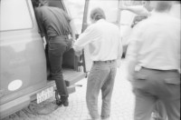 Image of sheet 19940310 photo 18: Ein Tag im Leben der Schweiz für Focale Contoir Suisse unterwegs
 mit Stadtpolizei Zürich, Herr Cortesi Pressestelle Urania Hauptwache um 6 Uhr 30. Polizei mit Hund Im Büro obszönes Alkoholiker Bäkeranlage Streifenwagen Limmat 4 grüsst sie. Befragung nach Brandstiftung durch Frau Polizeibeamtin Seiler (25) aus Steg Gampel und Herr Wachmeister Hochstrasser seit 21 Jahren im Dienst. Wache 4 mit Zellen Toilette und Frau Seiler. Waffe Einladen eines Verhafteten für den Spaziergang. 14.oo 69 PolizeiaspirantInnen vor der Seeüberquerung Wettkampf 1600m Beim Gang ins Wasser. Herr Leserf und Herr Zwahlen auf dem Polizeiboot. Zürich 1994