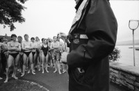 Image of sheet 19940310 photo 28: Ein Tag im Leben der Schweiz für Focale Contoir Suisse unterwegs
 mit Stadtpolizei Zürich, Herr Cortesi Pressestelle Urania Hauptwache um 6 Uhr 30. Polizei mit Hund Im Büro obszönes Alkoholiker Bäkeranlage Streifenwagen Limmat 4 grüsst sie. Befragung nach Brandstiftung durch Frau Polizeibeamtin Seiler (25) aus Steg Gampel und Herr Wachmeister Hochstrasser seit 21 Jahren im Dienst. Wache 4 mit Zellen Toilette und Frau Seiler. Waffe Einladen eines Verhafteten für den Spaziergang. 14.oo 69 PolizeiaspirantInnen vor der Seeüberquerung Wettkampf 1600m Beim Gang ins Wasser. Herr Leserf und Herr Zwahlen auf dem Polizeiboot. Zürich 1994