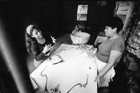Image of sheet 19940410 photo 3: Ich bin unterwegs mit Jamileh 19j. im Barrio San Judas. Sie geht von Haus zu Haus verteilt Kondome und macht für Si Mujer Reklame. Ueberschwemmung in Managua.
Nicaragua 1994

Women Health medicine clinic sexual education