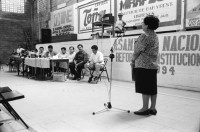 Image of sheet 19940750 photo 8: Eine Frau trägt ihre Forderungen zur Erneuerung der Verfassung einem Gremium vor. Strasse in Esteli. Uebersicht. Tor Porton. Autotüre türe. als Abschrankung. Akloholiker während Therapie im Hause für geschlagene Frauen. Accion ya. Junge Schwangere mit Kleinkind auf Bett. Eine junge Frau lebt mit ihrem kleinen Sohn stationär im Kriseninterventionszentrum. Esteli Nicaragua 1994 crisis familiar family mother and baby center abandoned young  

Sandinista National Liberation Front
Frente Sandinista de Liberación Nacional
FSLN
Leader 	Daniel Ortega
Founded 	1961

Ideology 	Democratic socialism
Sandinism
Social democracy
Marxism
Political position 	Left-wing

Seats in the National Assembly 	
63 / 90

Politics of Nicaragua
Political parties


The Sandinista National Liberation Front (Spanish: Frente Sandinista de Liberación Nacional, or FSLN) is today a social-democratic political party in Nicaragua. It started out communist in the 1980s. Its members are called Sandinistas in both English and Spanish. The party is named after Augusto César Sandino who led the Nicaraguan resistance against the United States occupation of Nicaragua in the 1930s