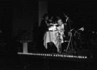 Image of sheet 19950030 photo 17: Gudrun liest am 20. Geburtstag für den Paranoia City Buchladen in der Kanzleiturnhalle in Zürich 1995 √