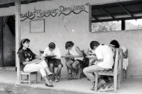 Image of sheet 19950150 photo 31: Die Schule ist benannt nach dem von der Contra getöteten Schweizers Maurice Demierre. Schülerinnen in der Landkooperative b. Lagartillo Nicaragua 1995  √

Coop owned school, named after swiss volunteer Maurice Demierre , killed by Contra rebels in 1986 girls women woman child teacher sandinista public exercises group students
