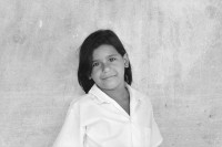 Image of sheet 19950150 photo 32: Die Tochter von Janet, der Lehrerin in Lagartillo bei Achuapa. Nicaragua 1995
School girl in coop owned school √
student child sandinist cooperative Sandinist Coop owned school, named after swiss volunteer 'Maurice Demierre', killed by the Contra in 1986