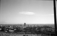 Image of sheet 19950410 photo 36: Ruth vor Hotel Koliba an der BushaltestelleUebersicht auf Hausberg Sicht auf Stadt. Strassenbahn