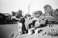 Image of sheet 19960010 photo 28: Beduin child Mother Women Woman boy garbidge Egypt
Kind wird beim Abfallklauen erwischt. Nuweiba Sinai 1996 √ Ägypten 

Nuweiba (Egyptian Arabic: نويبع, IPA: [neˈweːbeʕ]) is a coastal town in the eastern part of Sinai Peninsula, Egypt. Located on the coast of the Gulf of Aqaba.