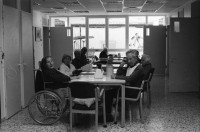 Image of sheet 19960070 photo 17: frtsg. 0060 Japanische Katholikengruppe mit Jesus beschrifteten Gilet's und Palmenpbätter. Sicht auf palästinensischer Teil. 'Putting Peace to Work' Plakat beim American Colony Hotel European Union EG Emblem an Auto. Tafel des American Colony Hotel Szene mit frommen Juden Lisbeth und Meret Innenstadt West-Jerusalem Vor Bank Männerhand fischt Schuhe aus Schaufenster. Bild von Alis Guggenheim im Israel Museum  14, 15 und 16 Sicht in arabischer Teil Jerusalems Altstadt mit Mädchen Schule Im Altersheim vom Kibbutz Maaborot. Alte sitzt im Schatten Baum eingebunden. Pflanzentopf. etc. Neubau für Kinderzuzug. Portrait von Dan Maas. 
Israel Palestine 1996

Ma'abarot is a kibbutz in Israel. Founded in 1932, today it has a population of approximately 850 people, and is under the jurisdiction of Hefer Valley Regional Counci