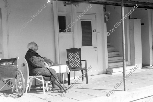 Image of sheet 19960070 photo 21: Pensioner and founder of the Kibbutz Ma'abarot makes siesta in the winter sun
Kibbutz Maaborot Israel 1. 1996 √ women retired 

Ma'abarot is a kibbutz in Israel. Founded in 1932, today it has a population of approximately 850 people, and is under the jurisdiction of Hefer Valley Regional Counci