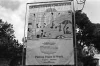 Image of sheet 19960070 photo 4: 'Putting Peace to Work' Plakat beim American Colony Hotel der European Union, Jerusalem 1996.